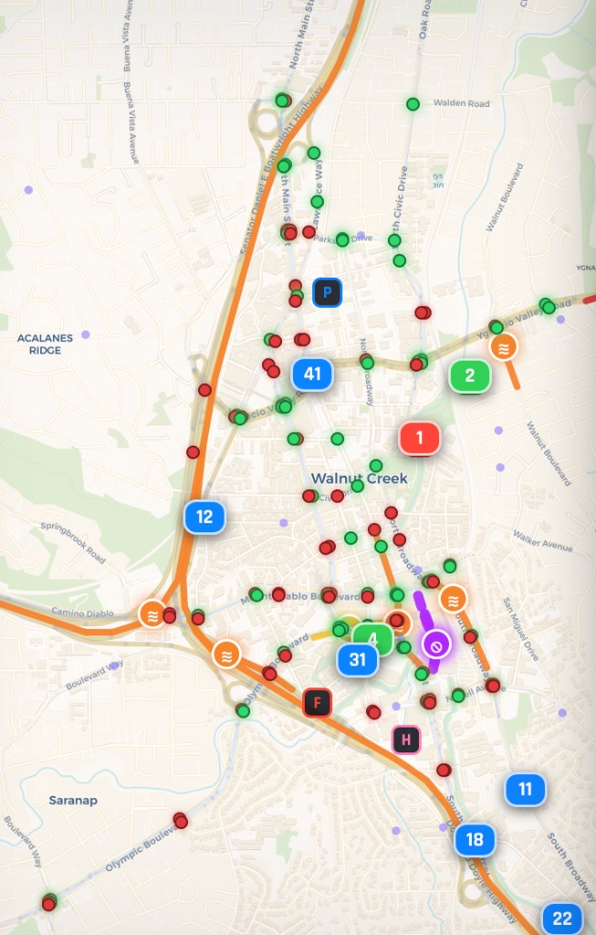 Zoomed detail of the live console map: numbered unit markers, green and red traffic-signal dots, orange traffic congestion, and a purple road closure over the Walnut Creek streets.
